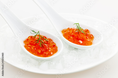 Photo: Caviar in spoons on ice Caviar in spoons on ice