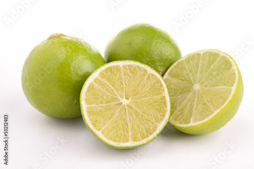 Photo: isolated green lemon isolated green lemon