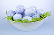 Blue Easter eggs in bowl