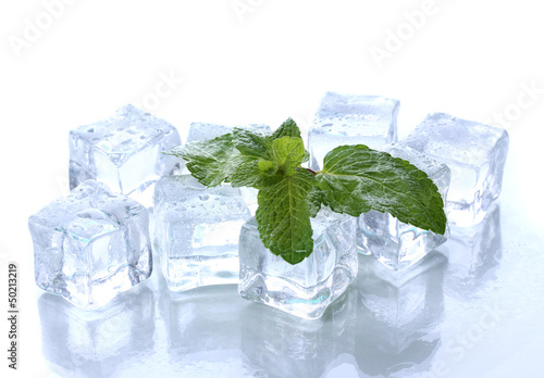 Photo: Ice with mint isolated on white Ice with mint isolated on white