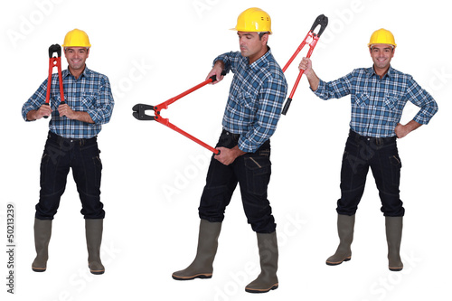 Photo: Worker with bolt cutters Worker with bolt cutters