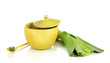 Diet soup with vegetables in cup isolated on white