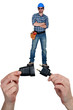 Cool electrician standing on a plug