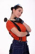 Working woman with mace on his shoulder