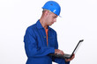 Mason with computer
