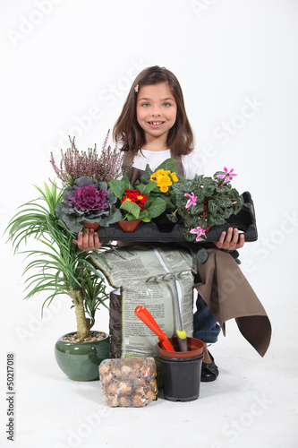 Photo: Portrait of a young florist Portrait of a young florist