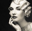 Monochrome picture of elegant blond retro woman 
