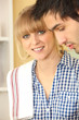 young couple cooking together