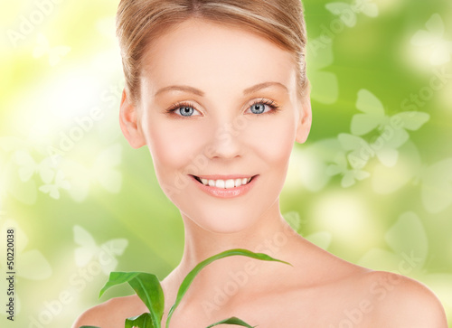 Photo: woman with sprout and butterflies woman with sprout and butterflies