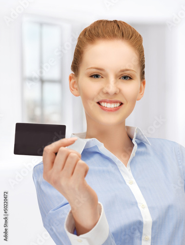 Photo: happy woman with credit card happy woman with credit card