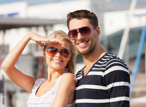 Photo: happy young couple in port happy young couple in port