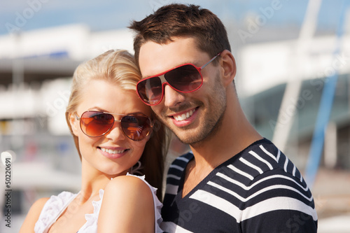 Photo: happy young couple in port happy young couple in port