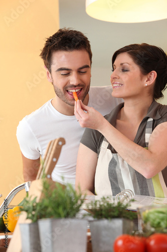 Photo: Couple in the kitchen Couple in the kitchen