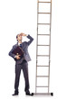 Businessman climbing the ladder isolated on white