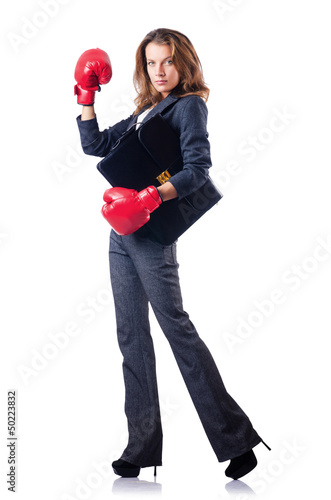 Photo: Woman businesswoman with boxing gloves on white Woman businesswoman with boxing gloves on white