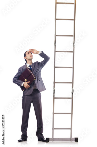 Photo: Businessman climbing the ladder isolated on white Businessman climbing the ladder isolated on white