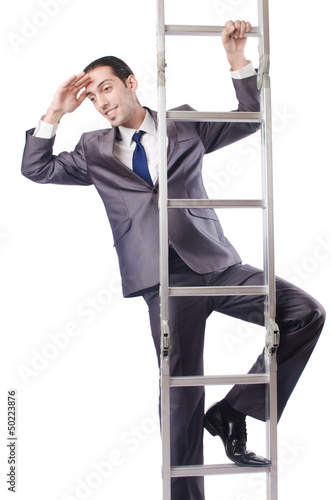 Photo: Businessman climbing the ladder isolated on white Businessman climbing the ladder isolated on white