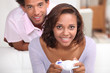 Couple playing computer games