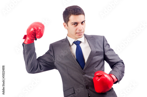 Photo: Businessman with boxing gloves on white Businessman with boxing gloves on white