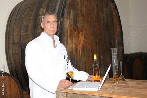Photo: Man testing wine Man testing wine