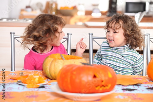 Photo: Children carving pumpkins Children carving pumpkins