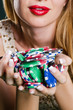 Woman in casino playing cards