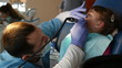 little girl in the dentist. Girl crying in pain
