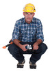 Builder with angle grinder