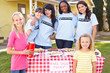Photo: Women And Children Running Charity Bake Sale Women And Children Running Charity Bake Sale