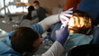 dentist treats teeth child