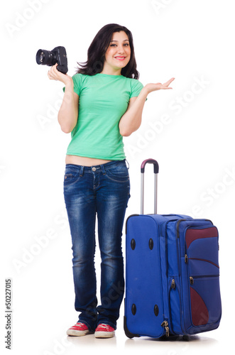 Photo: Young girl with travel case and camera Young girl with travel case and camera