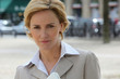 Businesswoman on the sidewalk