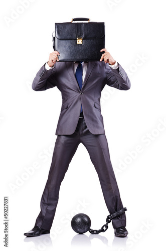 Photo: Businessman with shackles on white Businessman with shackles on white