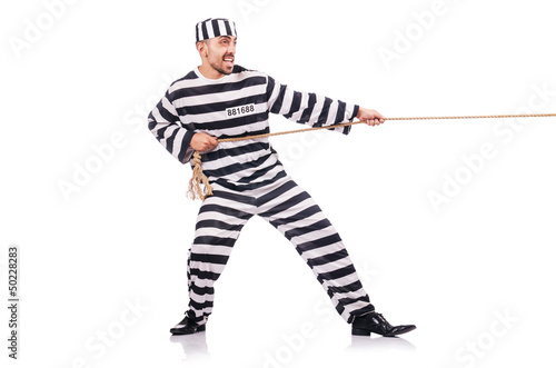 Photo: Convict criminal in striped uniform Convict criminal in striped uniform
