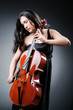 Woman cellist performing with cello