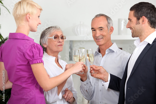 Photo: Family with champagne glasses Family with champagne glasses