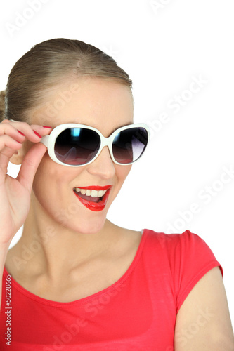 Photo: Woman wearing oversized sunglasses Woman wearing oversized sunglasses