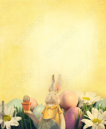 Photo: Easter bunny with eggs and flowers Easter bunny with eggs and flowers