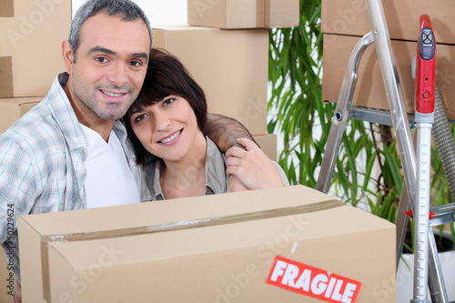 Photo: Couple moving home Couple moving home
