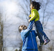 Daddy and daughter playing at park
