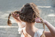 Little girl with pigtails