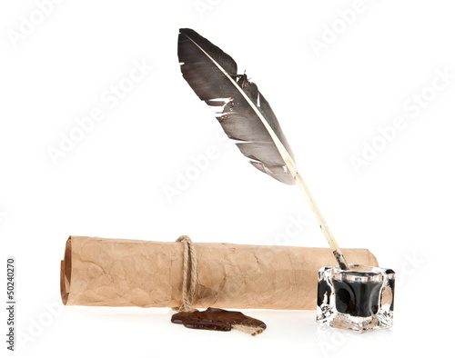 Photo: old paper and ink-pot with a feather old paper and ink-pot with a feather