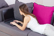 teenage girl using laptop