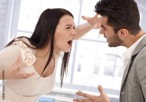 Photo: Young woman shouting at boyfriend Young woman shouting at boyfriend