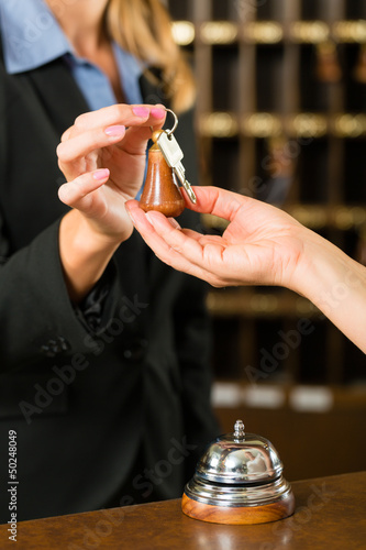 Photo: Reception - Guest checking in a hotel Reception - Guest checking in a hotel