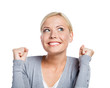 Woman with her fists up, isolated on white