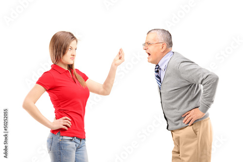 Photo: Angry father shouting at his daughter Angry father shouting at his daughter