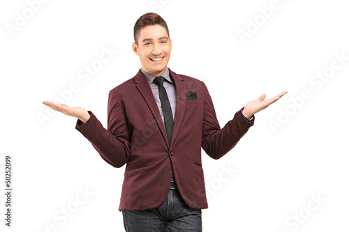 Photo: Stylish smiling male gesturing with hands Stylish smiling male gesturing with hands
