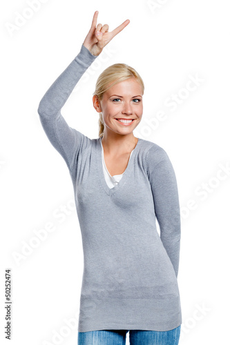 Photo: Lady gesturing rock sign with hand, isolated on white Lady gesturing rock sign with hand, isolated on white