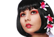 geisha makeup, beautiful girl with red flowers in her hair